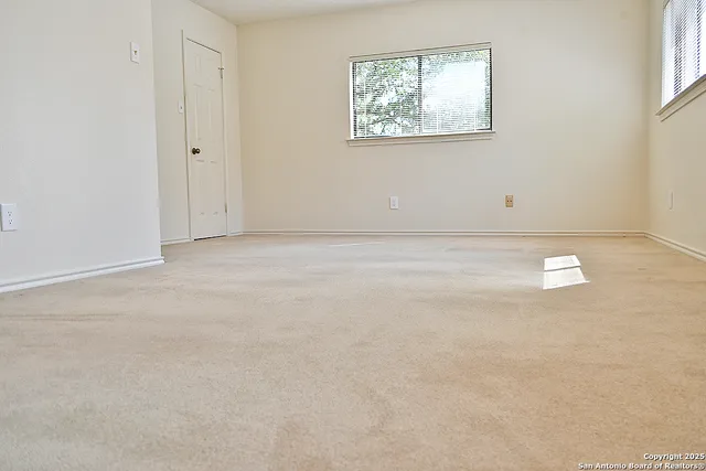 an empty room with a window