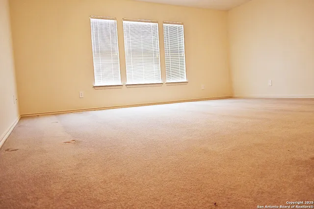 a bathroom with a shower and a sink