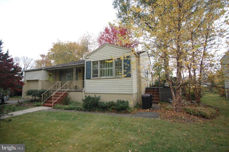 3209 Northbrook Road Pikesville, MD 21208 - Photo 1 of 13 a view of a house with a yard