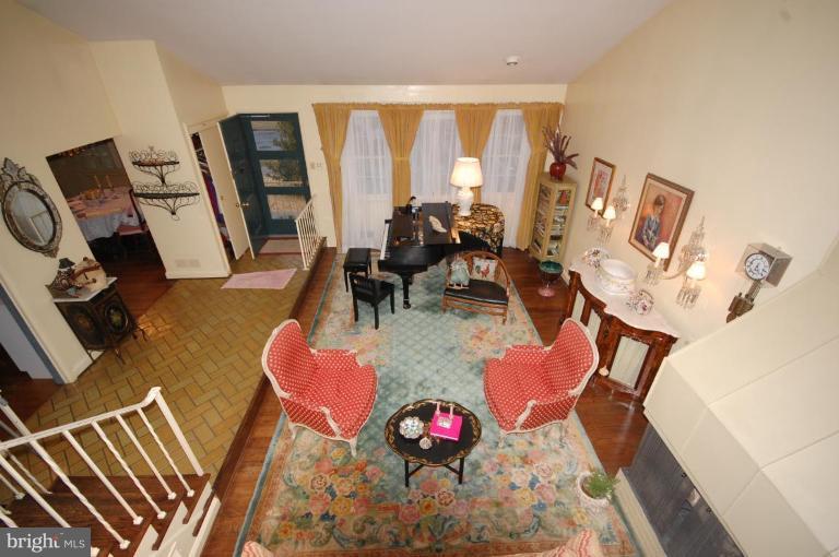 3209 Northbrook Road Pikesville, MD 21208 - Photo 3 of 13 a living room with furniture and a floor to ceiling window