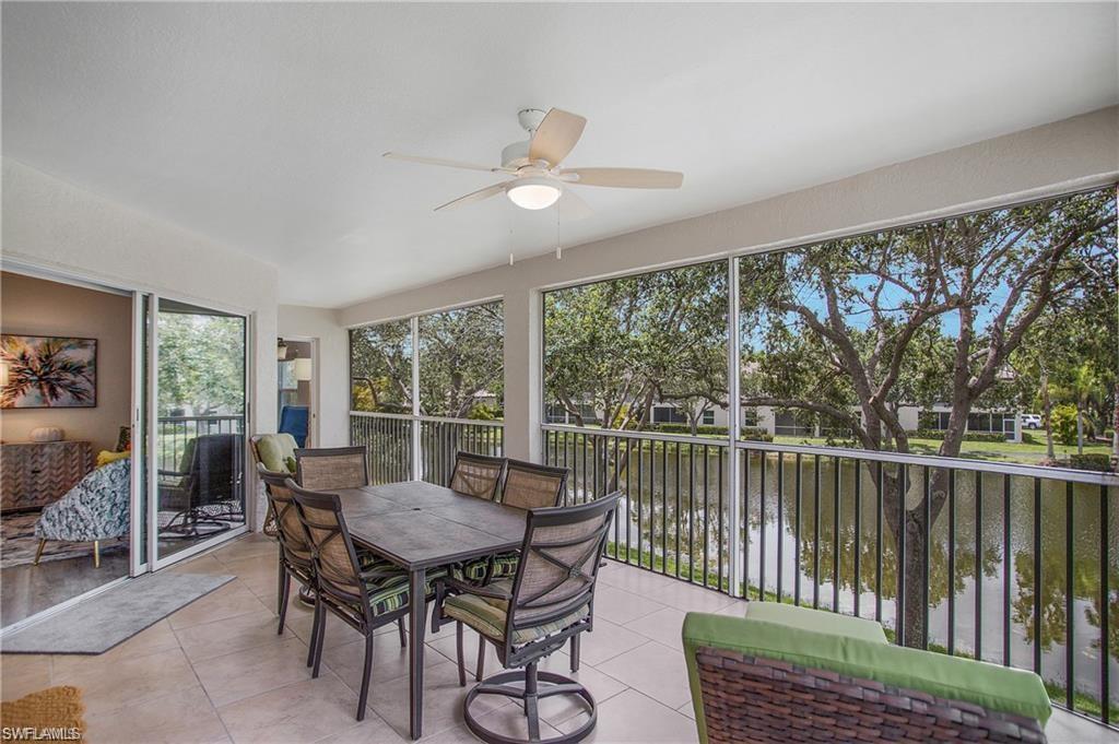 700 Diamond Circle, Unit 706 Naples, FL 34110 - Photo 28 of 37 a view of a dining room with furniture window and outside view