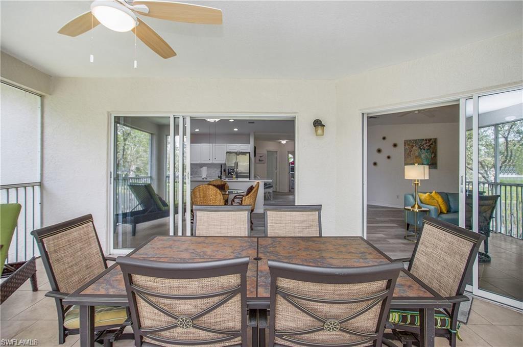 700 Diamond Circle, Unit 706 Naples, FL 34110 - Photo 30 of 37 a outdoor space with chairs