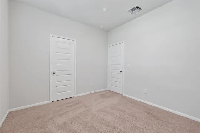 an empty room with closet