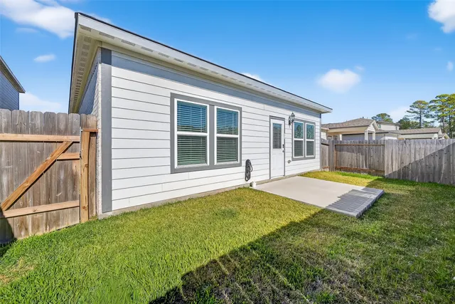 a view of a backyard with a garden