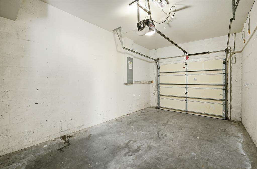 5002 Beechcraft Way Seffner, FL 33584 - Photo 19 of 26 a view of a room with racks on the wall
