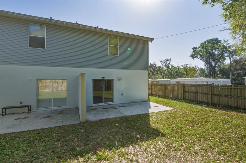 5002 Beechcraft Way Seffner, FL 33584 - Photo 21 of 26 a front view of a house having yard