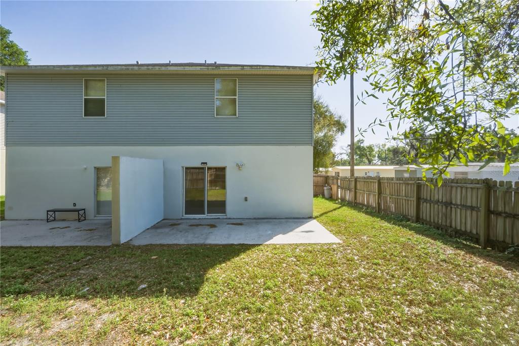 5002 Beechcraft Way Seffner, FL 33584 - Photo 22 of 26 a backyard of a house with lots of green space