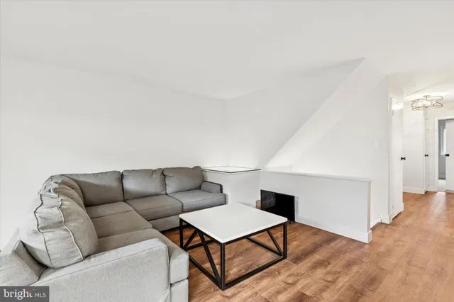 a living room with furniture and a couch