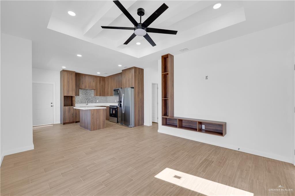 2903 Gabriel Street, Unit 1 Mission, TX 78574 - Photo 3 of 11 a view of a kitchen with a sink cabinets and stainless steel appliances