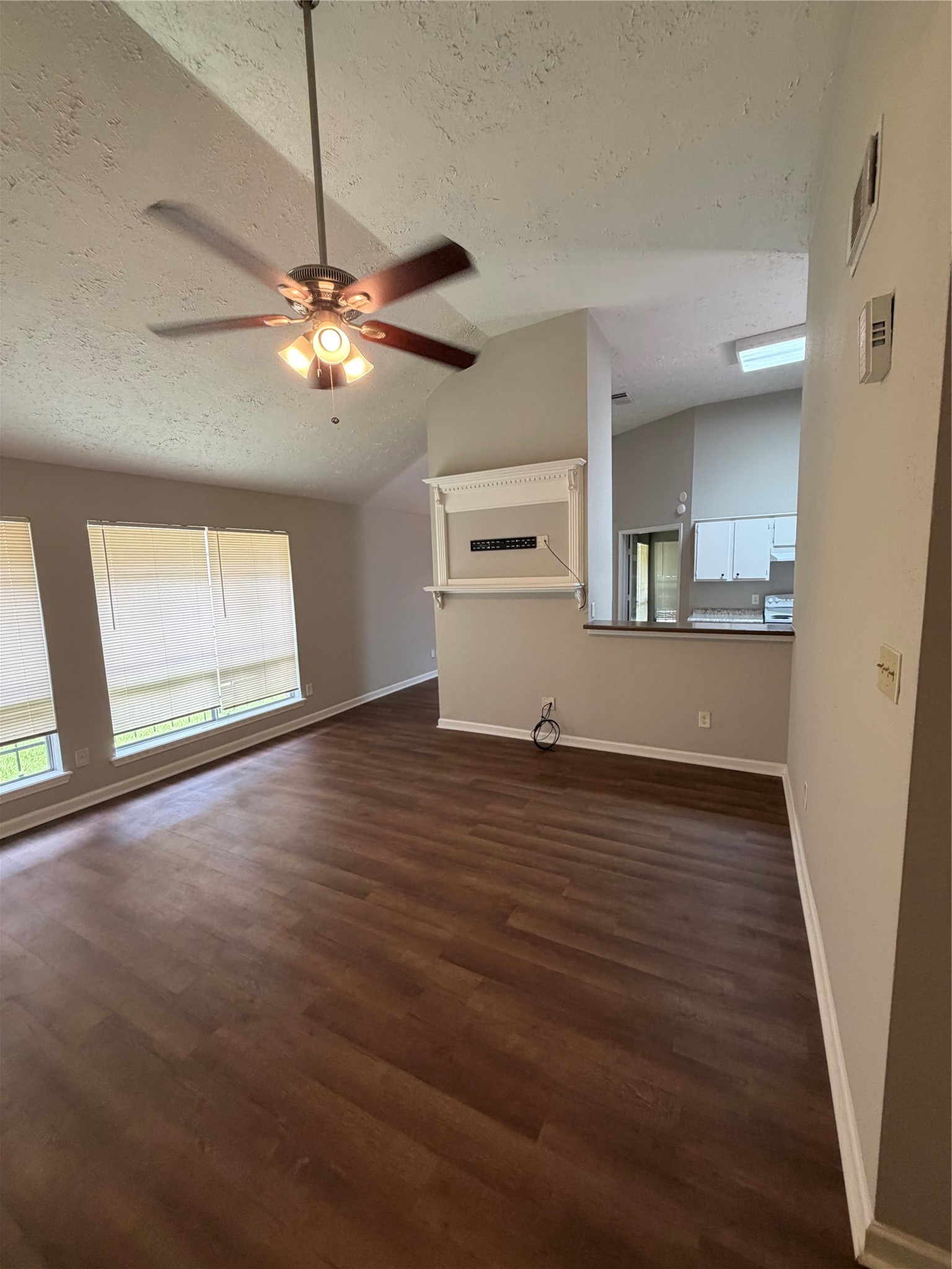 8662 Pearl Point Street Houston, TX 77044 - Photo 26 of 28 a view of empty room with wooden floor and fan