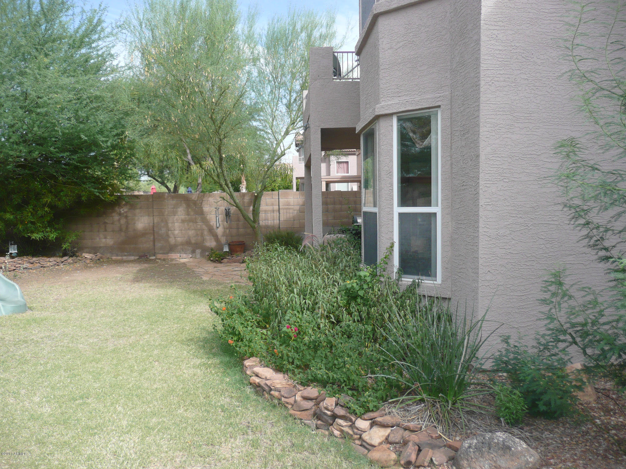 4510 East Rowel Road Phoenix, AZ 85050 - Photo 24 of 29 front view of a house with a yard