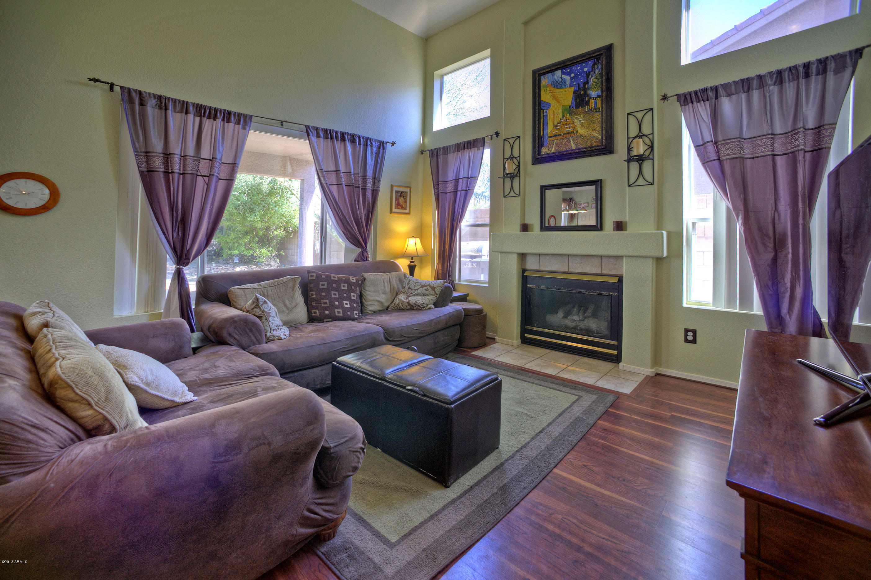 4510 East Rowel Road Phoenix, AZ 85050 - Photo 6 of 29 a living room with furniture fireplace and window