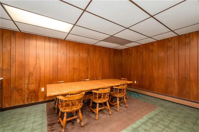 a kitchen with a sink a stove and cabinets