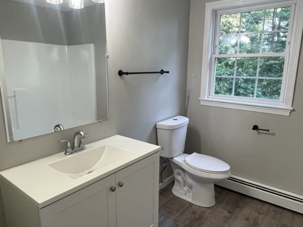 5 Winesap Way Ashland, MA 01721 - Photo 14 of 22 a bathroom with a sink toilet and a window