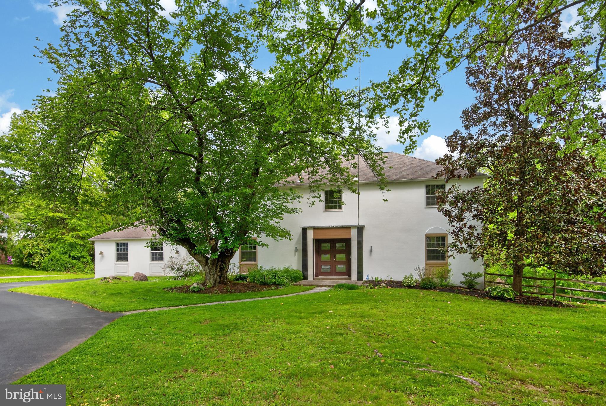 700 Campwoods Road Villanova, PA 19085 - Photo 77 of 77 a front view of a house with a garden