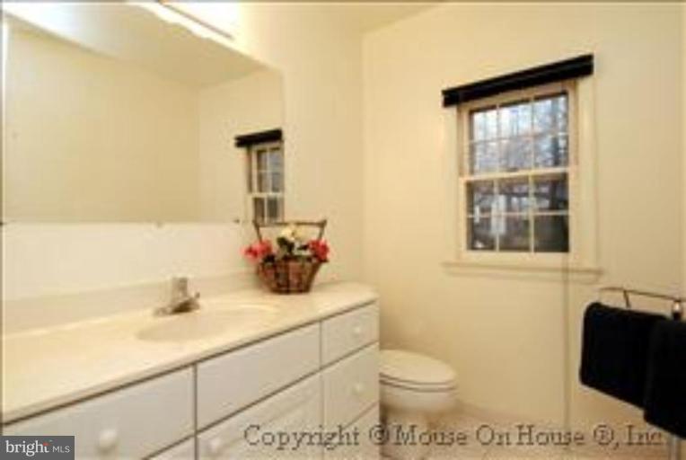 9211 Friars Road Bethesda, MD 20817 - Photo 22 of 30 Main level half bath is spacious and neutral