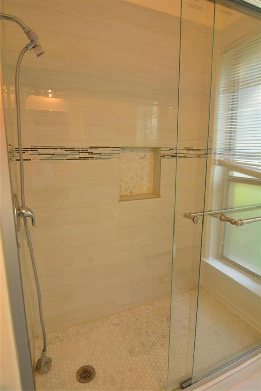 210 Apollo Road Garland, TX 75040 - Photo 20 of 27 a bathroom with a shower