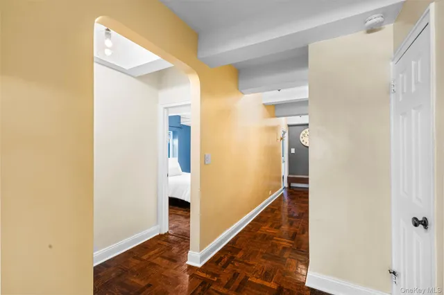 a view of a hallway with front door