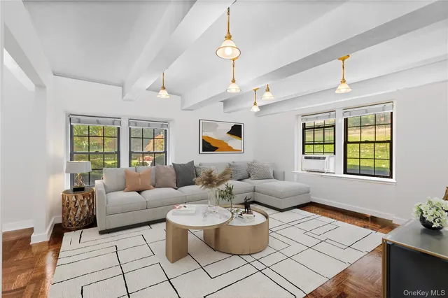 a living room with furniture and window