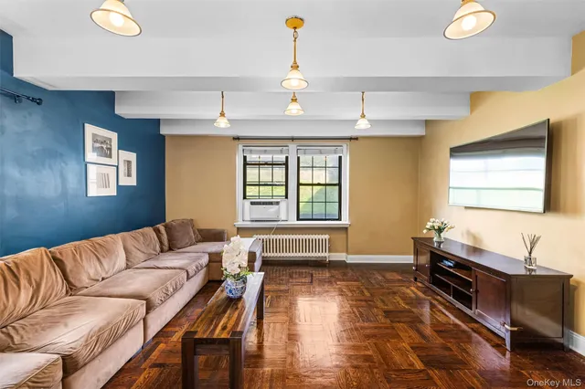 a living room with furniture and window