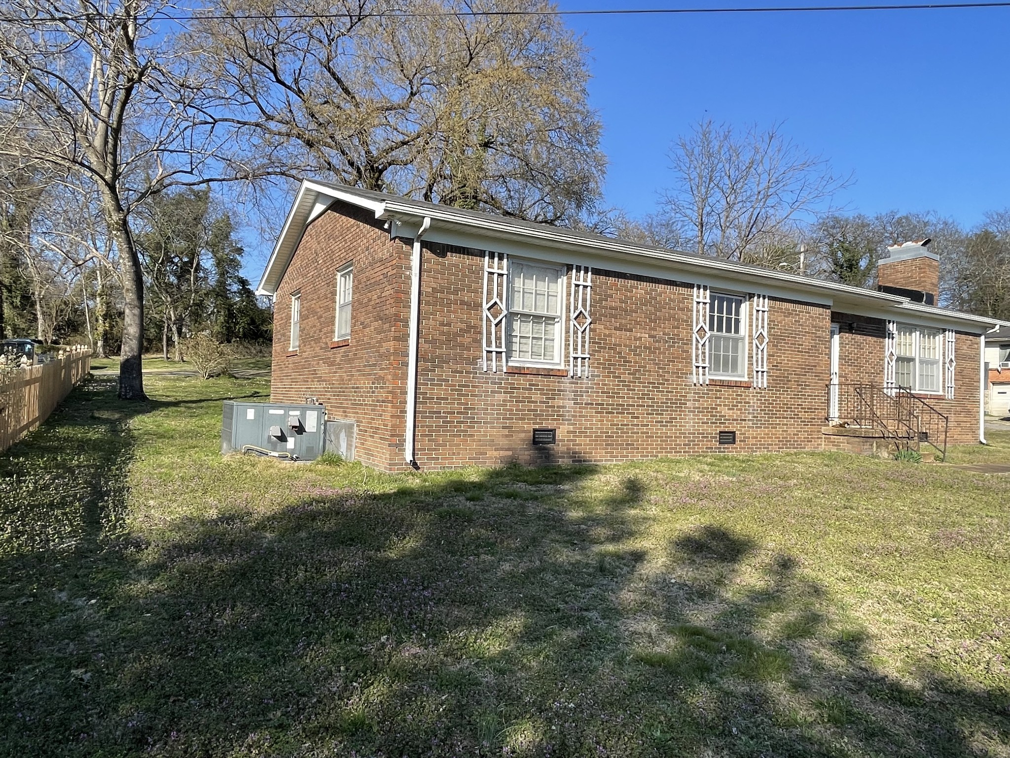 550 East Jefferson Street Pulaski, TN 38478 - Photo 6 of 23 a view of a backyard with large tree