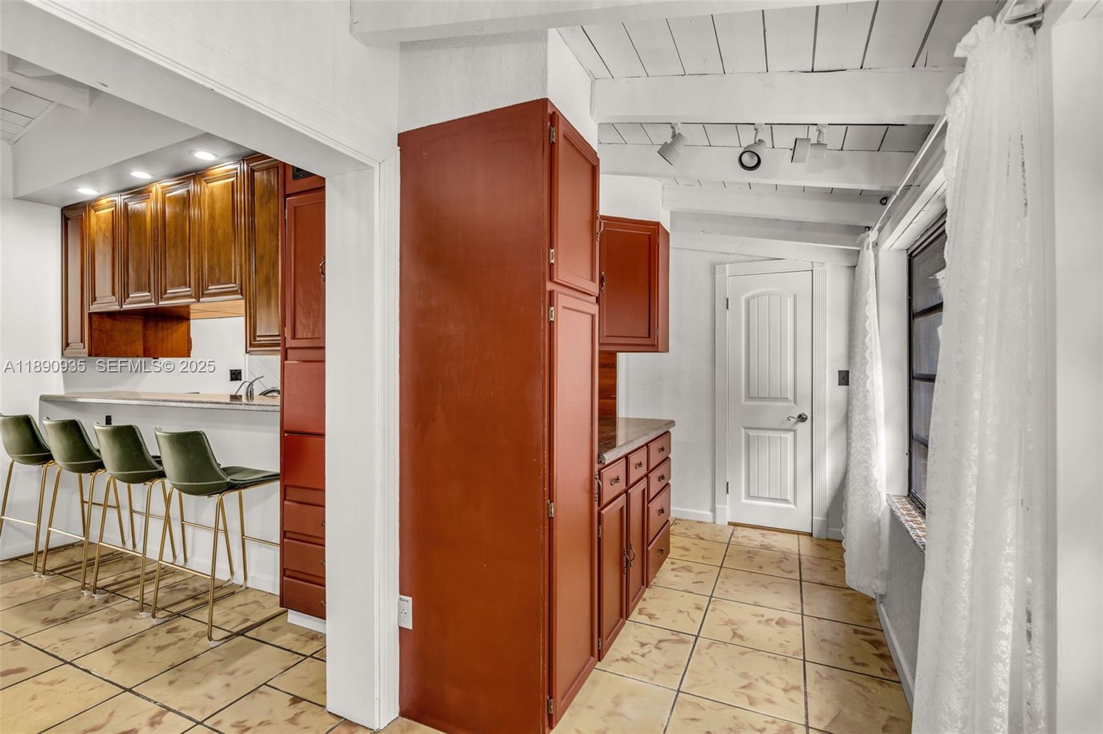 6031 Southwest 82nd Avenue Miami, FL 33143 - Photo 17 of 42 a very nice looking space with a hardwood floor