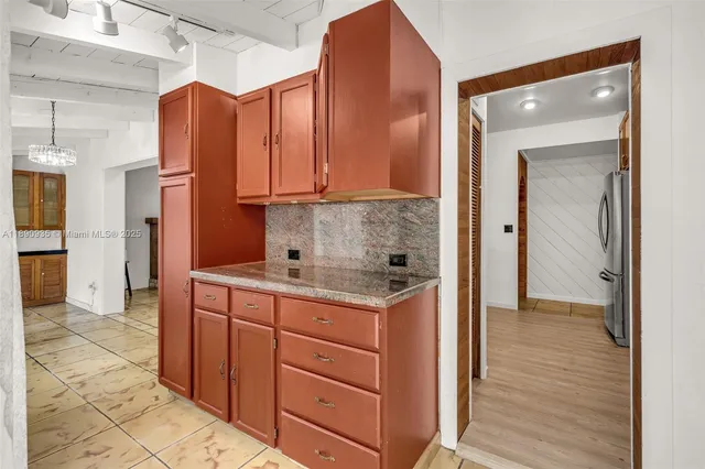 a view of a entryway door to ceiling room