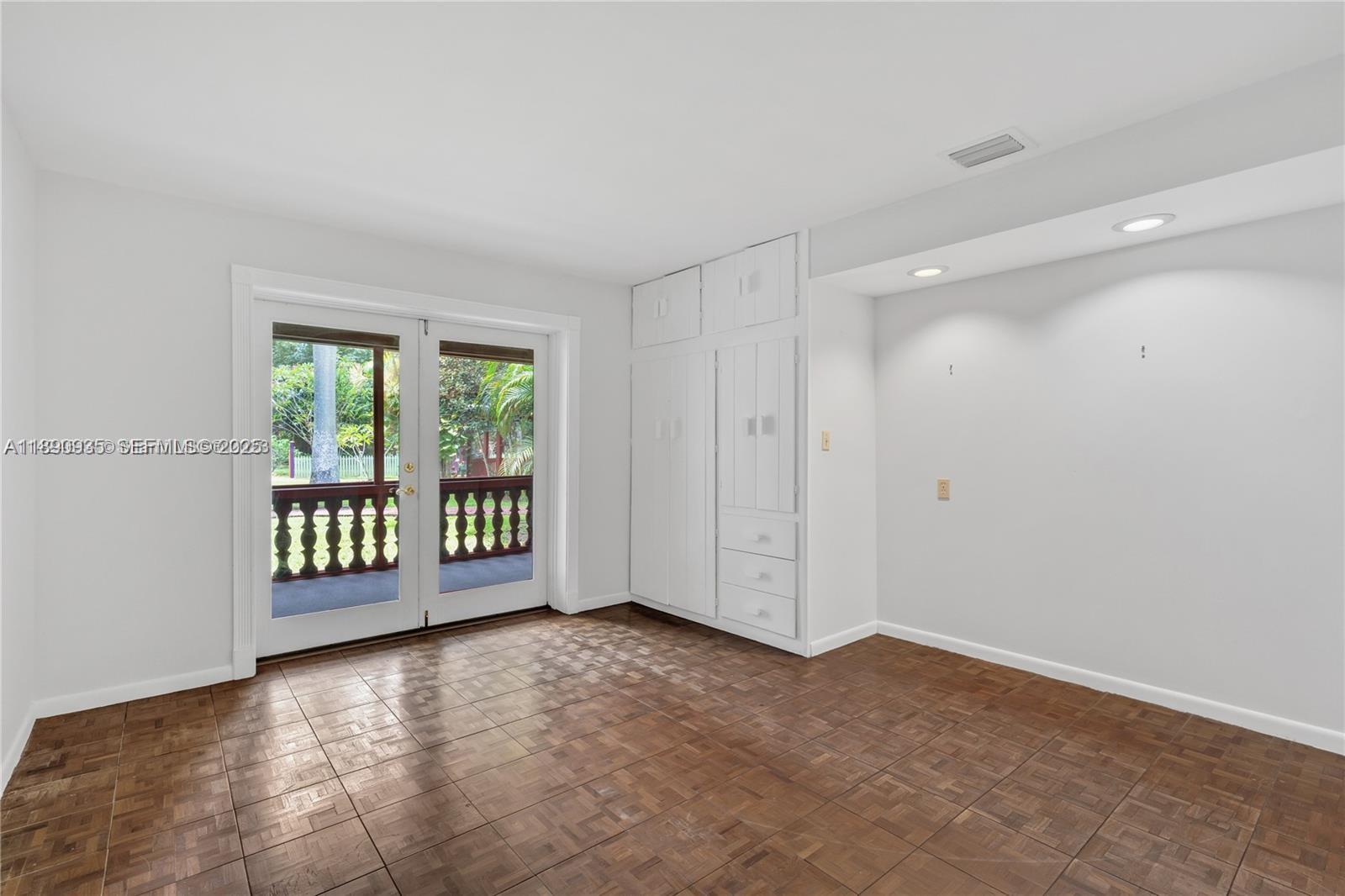 6031 Southwest 82nd Avenue Miami, FL 33143 - Photo 20 of 42 a view of an empty room with glass door