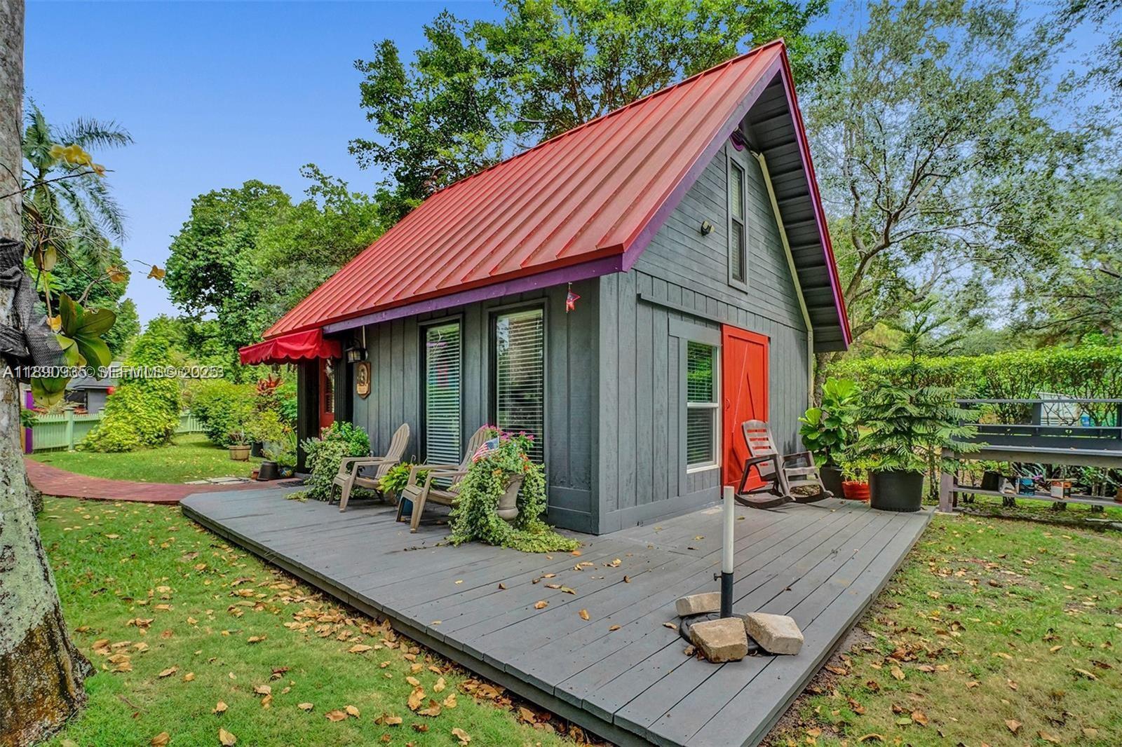 6031 Southwest 82nd Avenue Miami, FL 33143 - Photo 33 of 42 a front view of house with yard