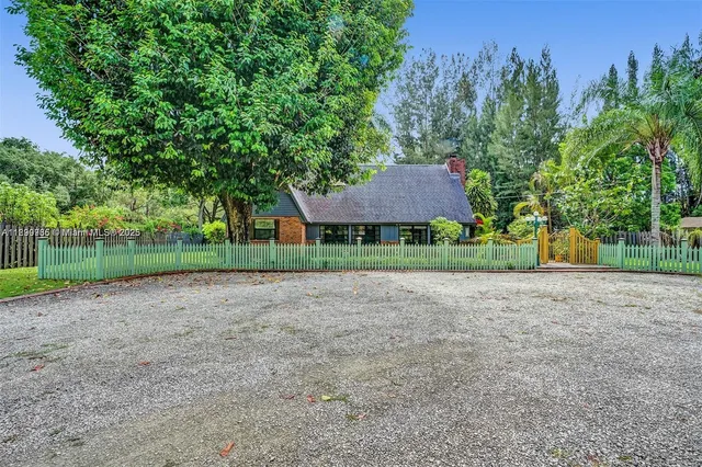 a view of backyard with green space