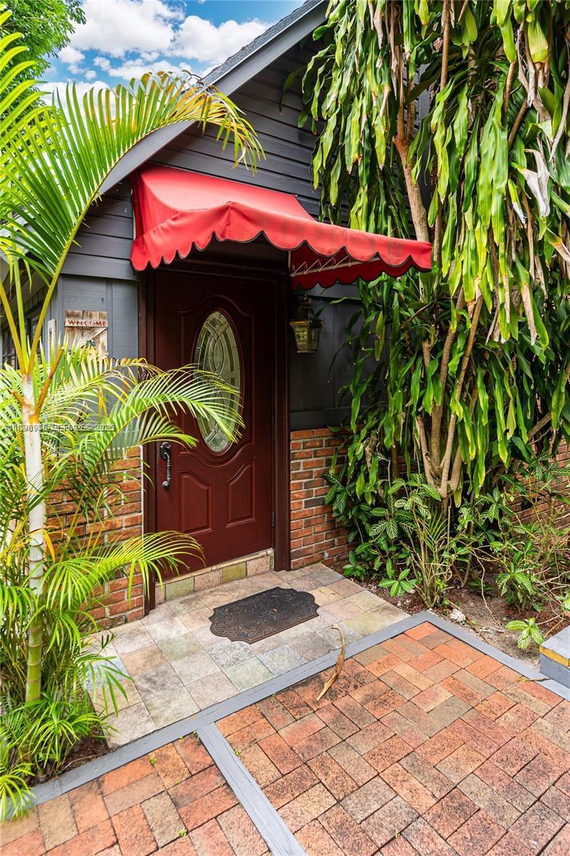 6031 Southwest 82nd Avenue Miami, FL 33143 - Photo 6 of 42 a view of swimming pool with a yard