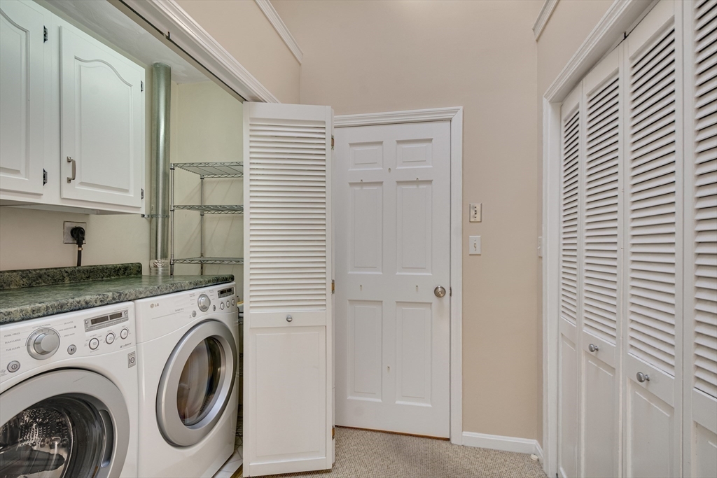 6 Apollo Circle Lexington, MA 02421 - Photo 18 of 38 a view of entryway with washer and dryer