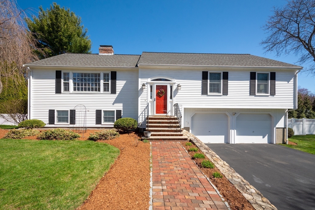 6 Apollo Circle Lexington, MA 02421 - Photo 2 of 38 a front view of a house with a yard