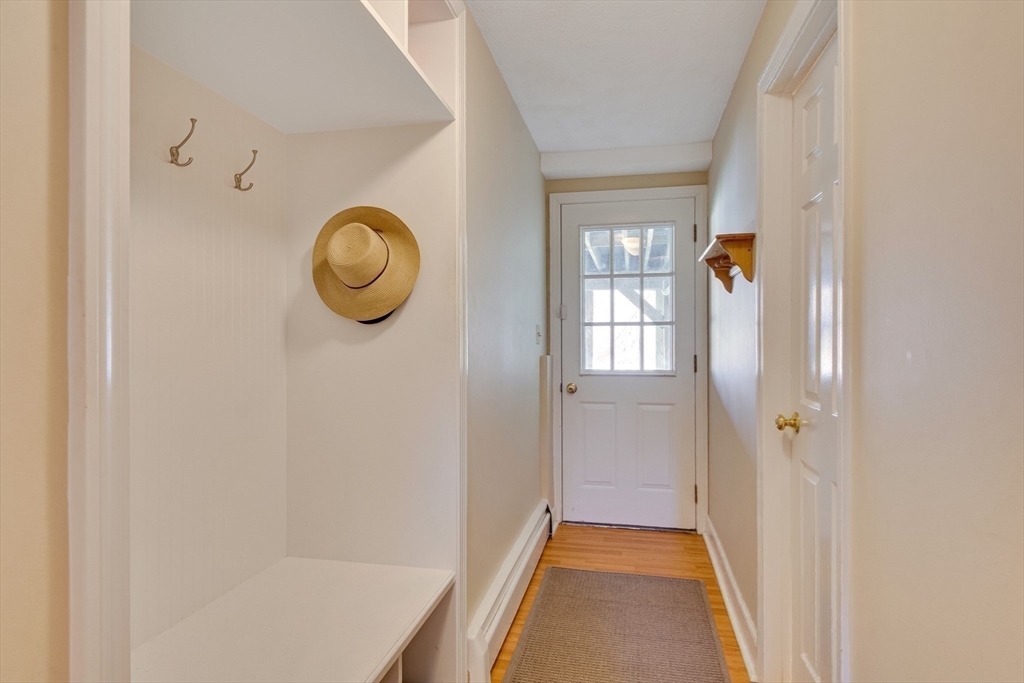 6 Apollo Circle Lexington, MA 02421 - Photo 24 of 38 a view of a livingroom with wooden floor and a window