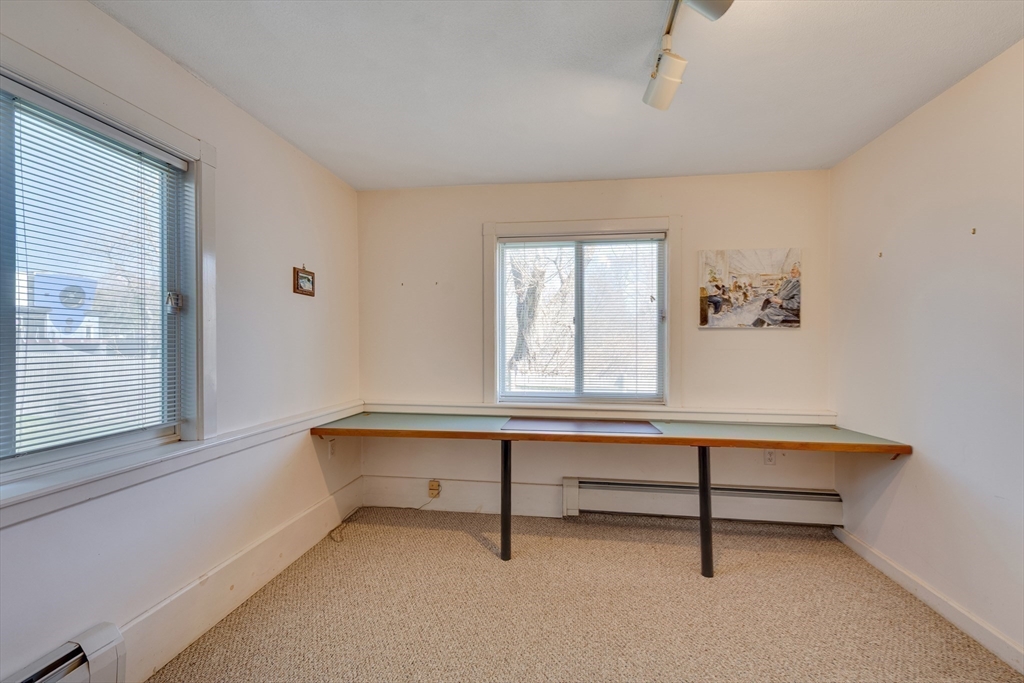 6 Apollo Circle Lexington, MA 02421 - Photo 25 of 38 a living room with furniture and a window