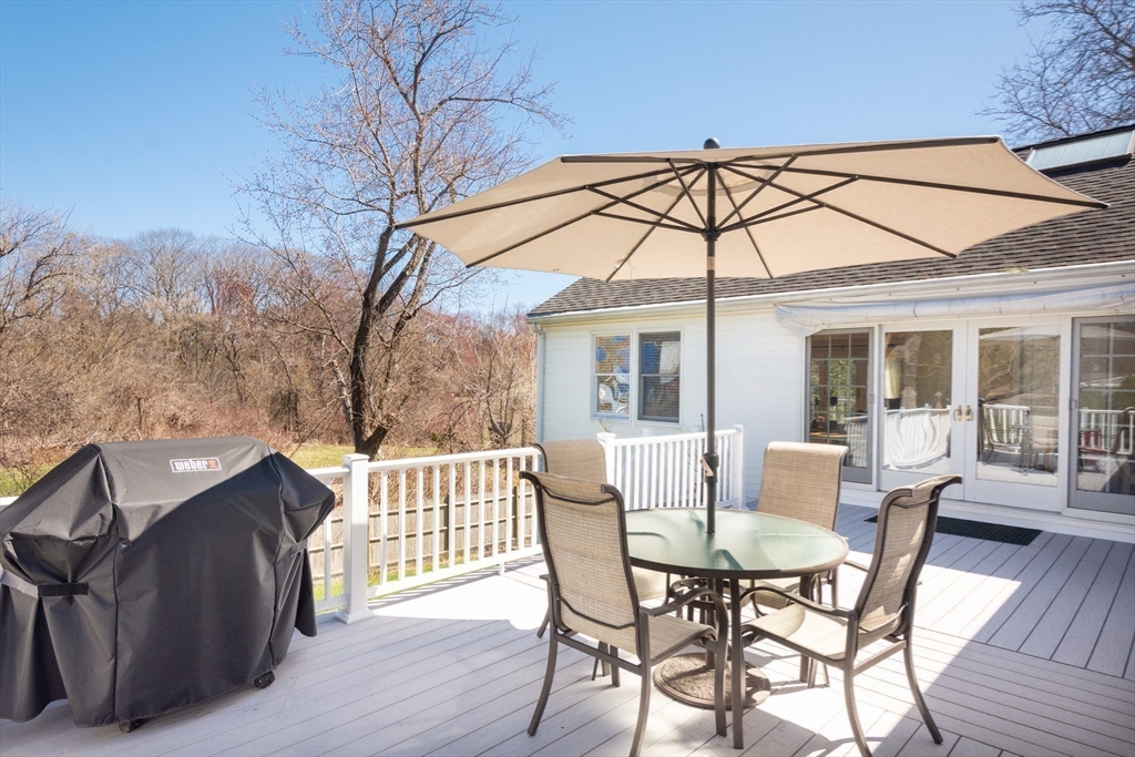6 Apollo Circle Lexington, MA 02421 - Photo 32 of 38 a view of a house with backyard and sitting area