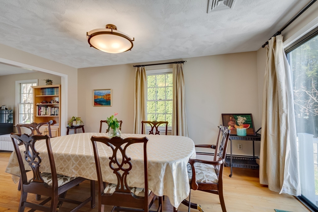 6 Apollo Circle Lexington, MA 02421 - Photo 10 of 38 a view of a dining room with furniture and window