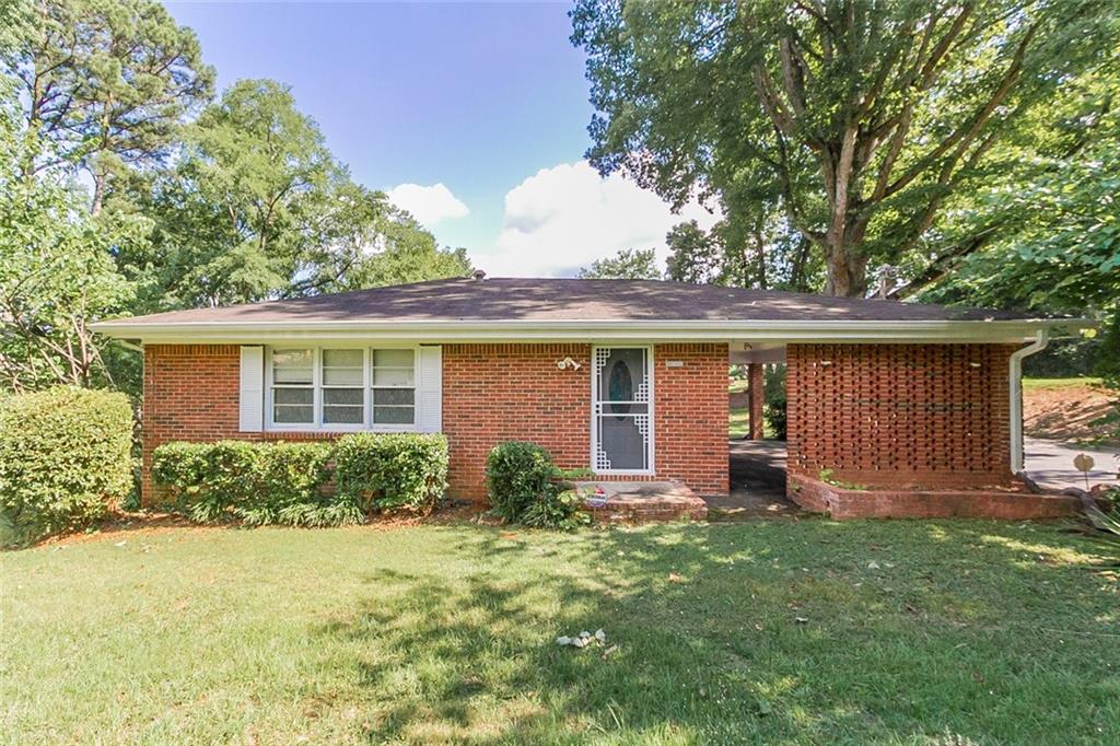 3727 Boring Road Decatur, GA 30034 - Photo 1 of 1 a front view of house with yard and outdoor seating