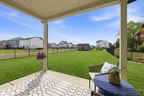 a front view of a house having yard
