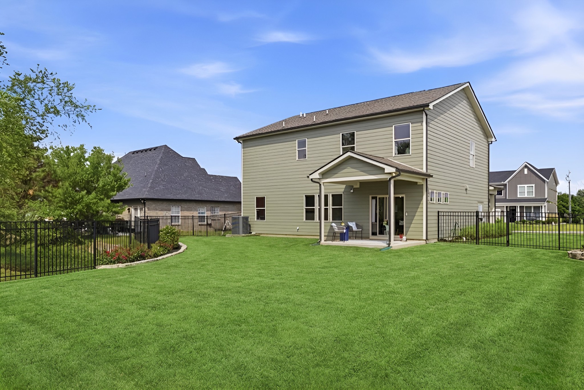 3044 Community Circle Murfreesboro, TN 37128 - Photo 47 of 53 a front view of a house with a yard and porch