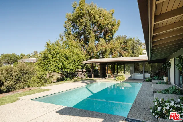 a view of outdoor space yard deck patio and swimming pool