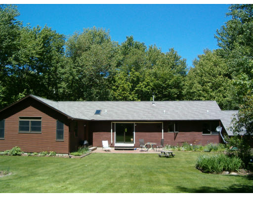 86 Pratt Corner Road Shutesbury, MA 01072 - Photo 4 of 7 front view of a house with a yard