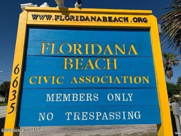 a sign on the wall of a building