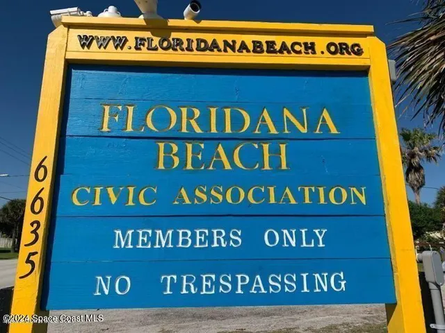 a sign on the wall of a building