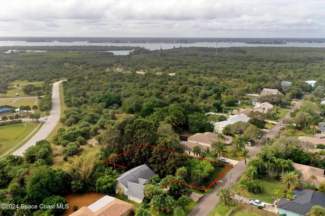 a view of a city with an ocean