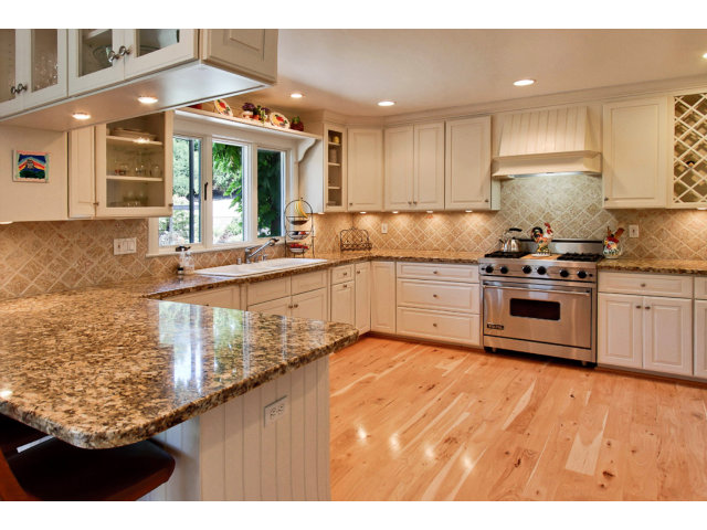 1020 Pleasant Valley Road Aptos, CA 95003 - Photo 5 of 25 a kitchen with stainless steel appliances granite countertop a stove a sink dishwasher and a oven with cabinets