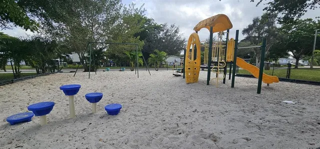 a view of outdoor space with swings