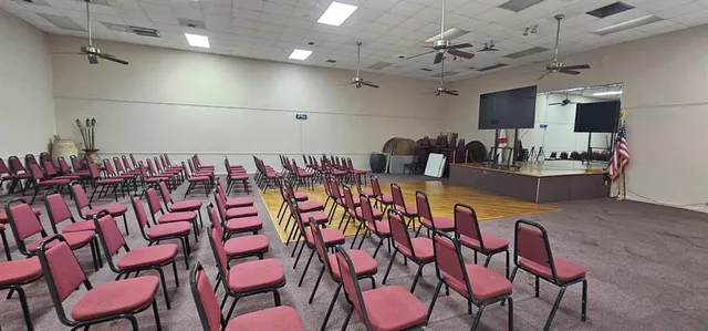 a view of a swimming pool with a patio