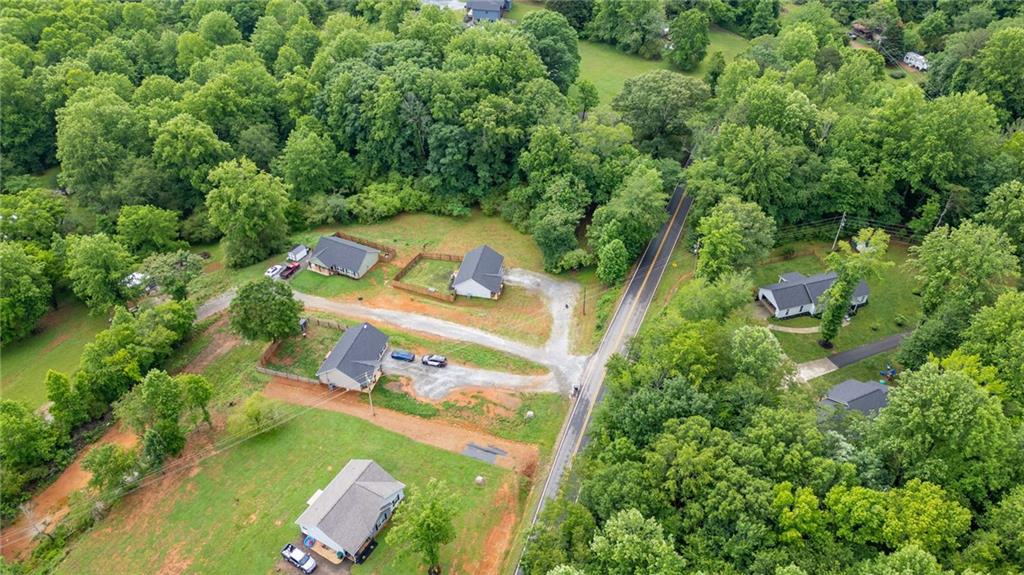 118 Wash Rider Road Dahlonega, GA 30533 - Photo 31 of 37 an aerial view of a house with a yard