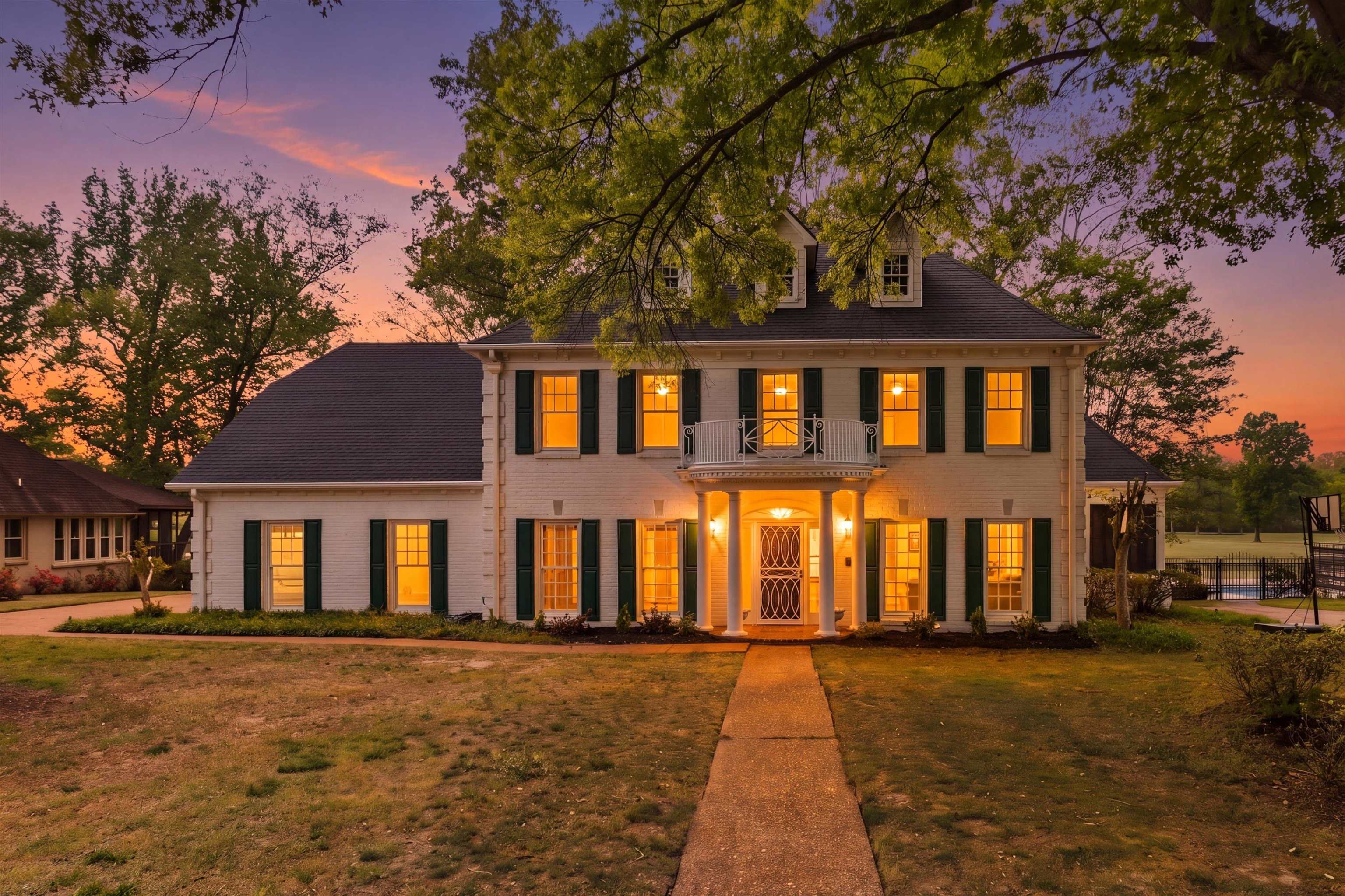 2783 West Levee Oaks Collierville, TN 38017 - Photo 1 of 40 a front view of a house with a yard